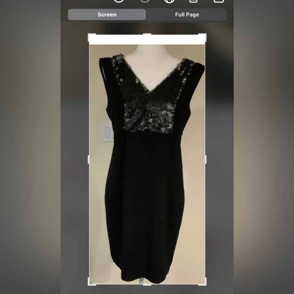 Black crepe sleeveless lined dress in excellent condition. Smoke free home.